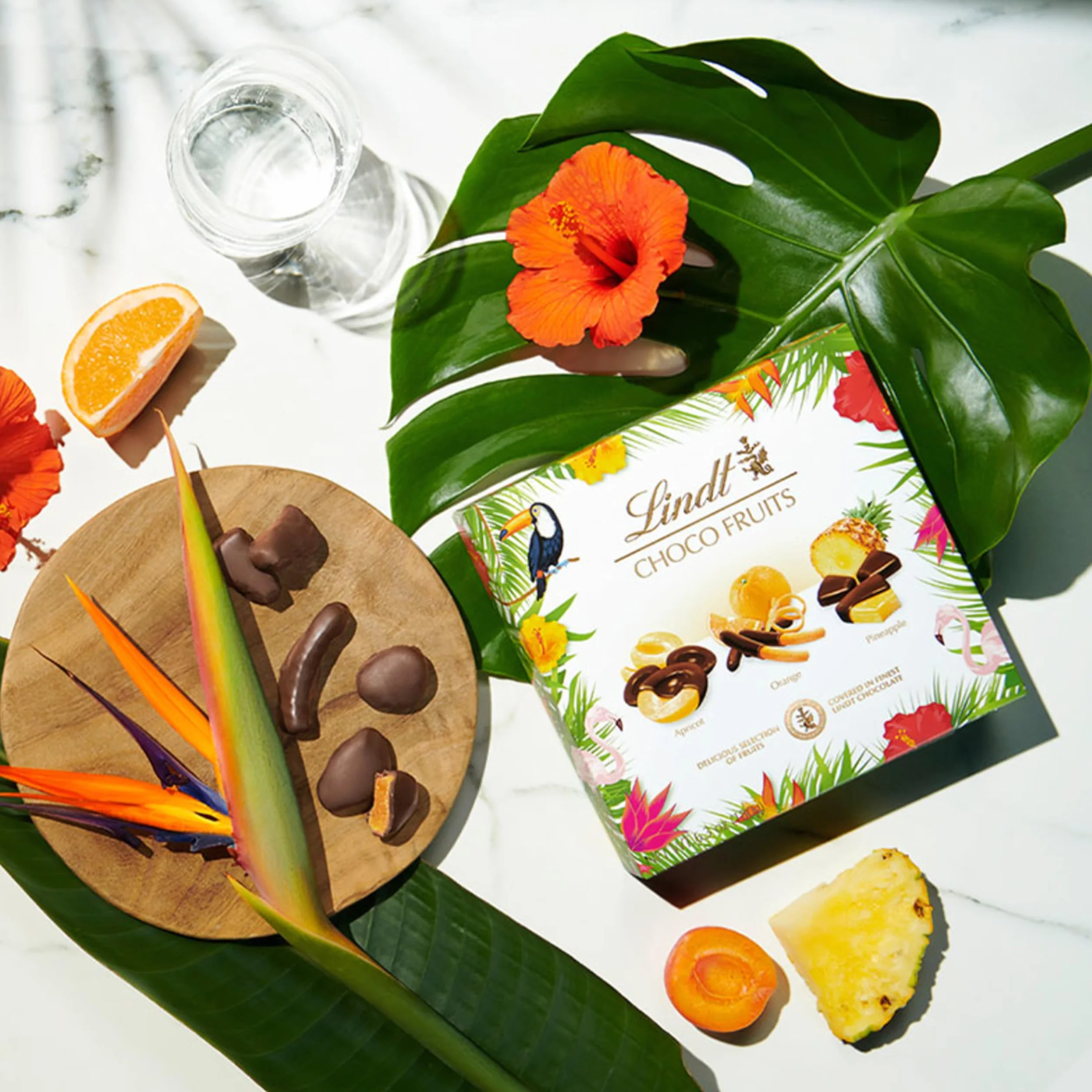 Lindt - Pudełko CHOCO OWOCE Moreela, pomarańczowe, ananas - czarna czekolada, 180g